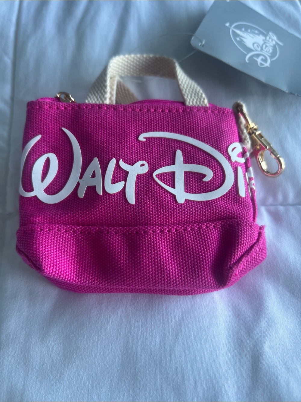 Disney Hot Pink Mini Tote Keychain with Cream Handle and White Logo